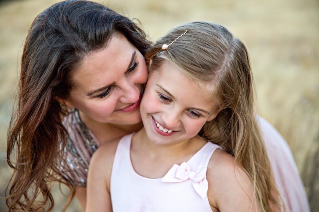 smiling mom and child
